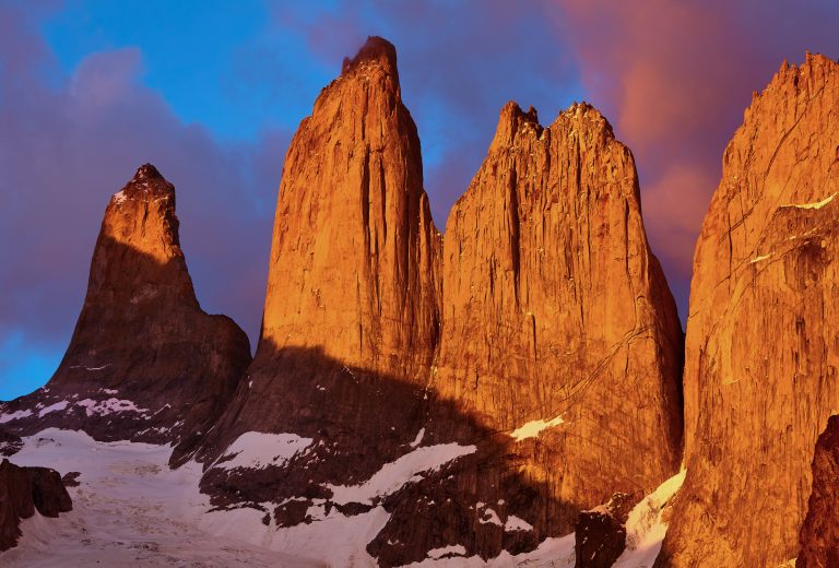 Towers of Paine at purple sunrise, Torres del Paine National Park, Patagonia, Chile.