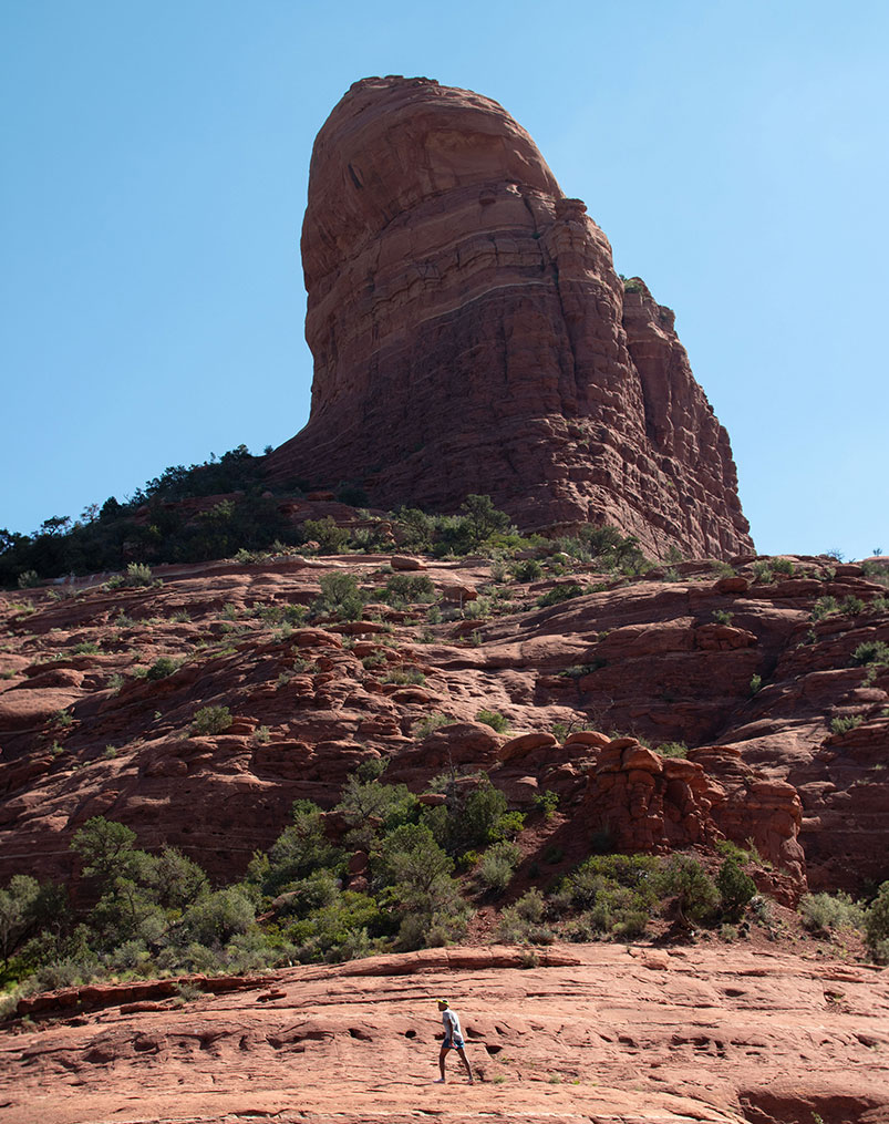 Runners hugging on red rock in Sedona
